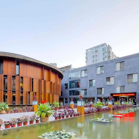 China Community Culture & Art Hotel Циндао Экстерьер фото