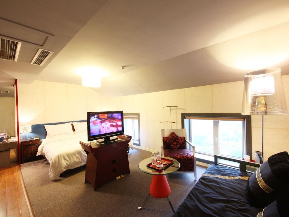 China Community Culture & Art Hotel Циндао Экстерьер фото