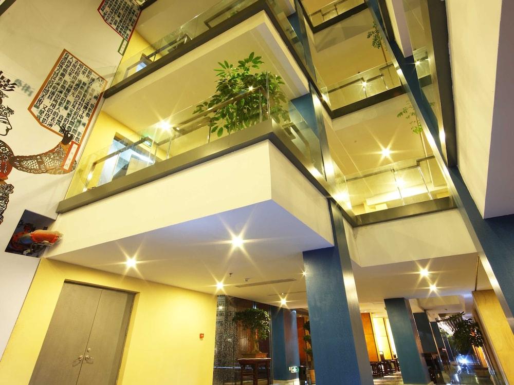 China Community Culture & Art Hotel Циндао Экстерьер фото