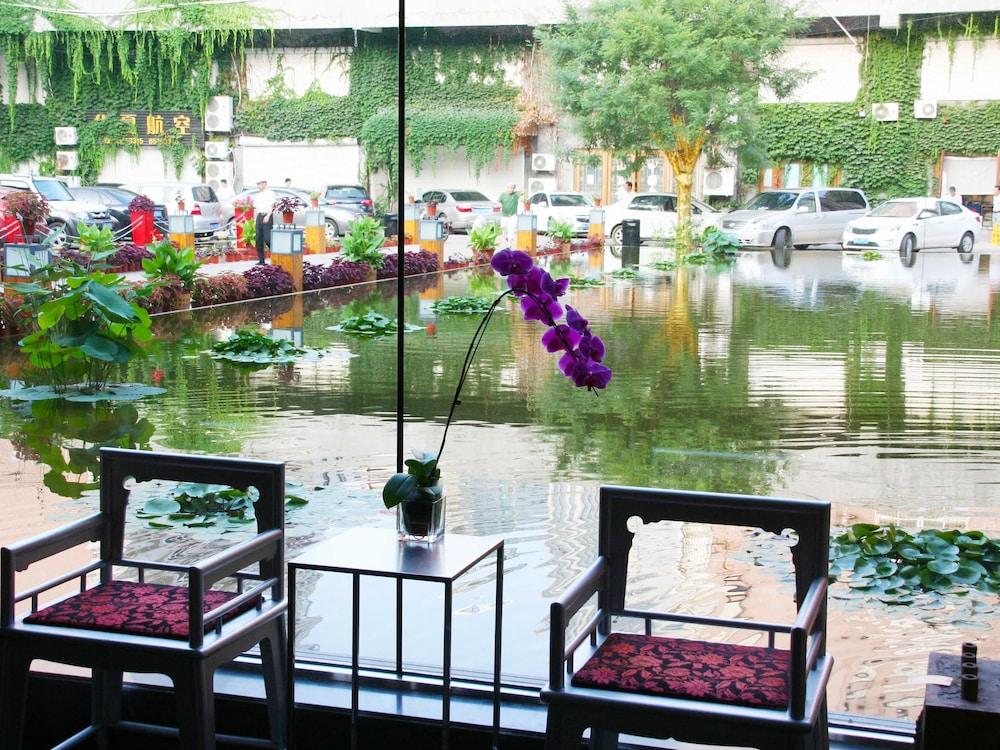 China Community Culture & Art Hotel Циндао Экстерьер фото