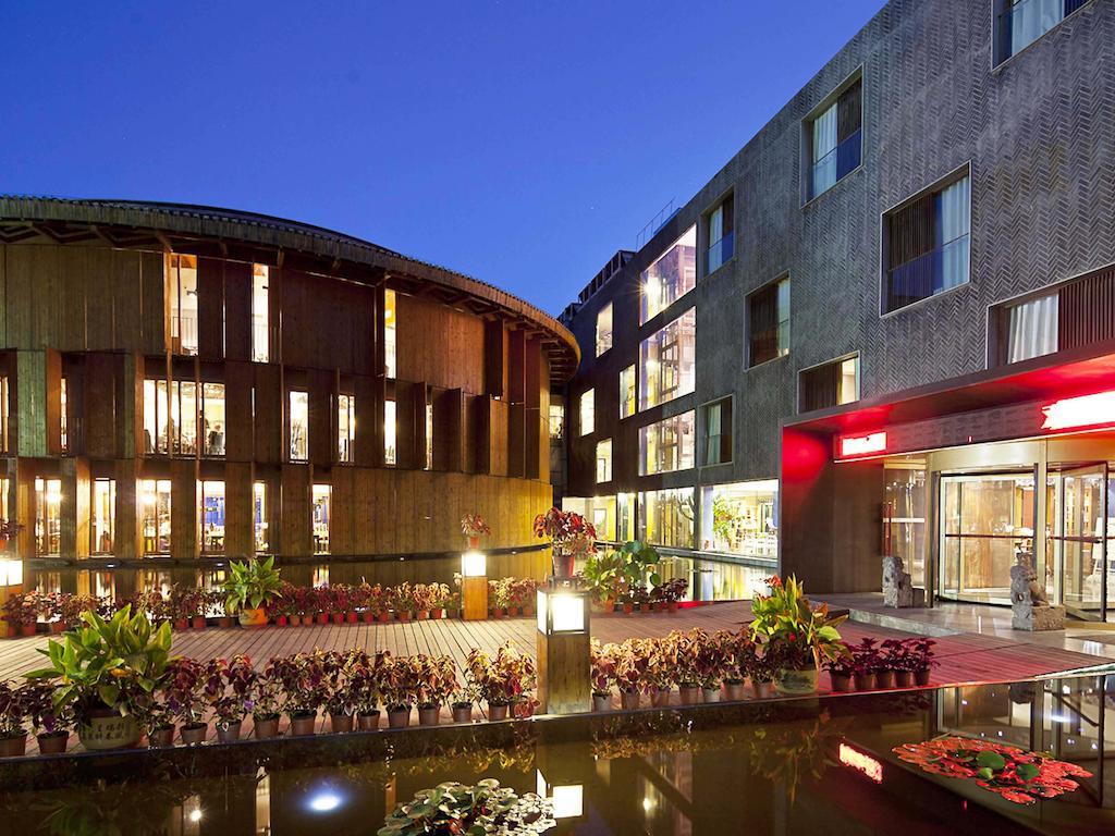 China Community Culture & Art Hotel Циндао Экстерьер фото