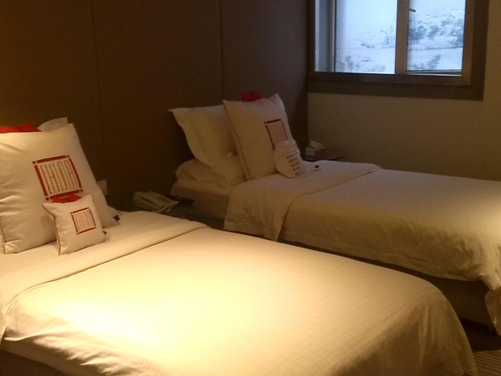 China Community Culture & Art Hotel Циндао Экстерьер фото