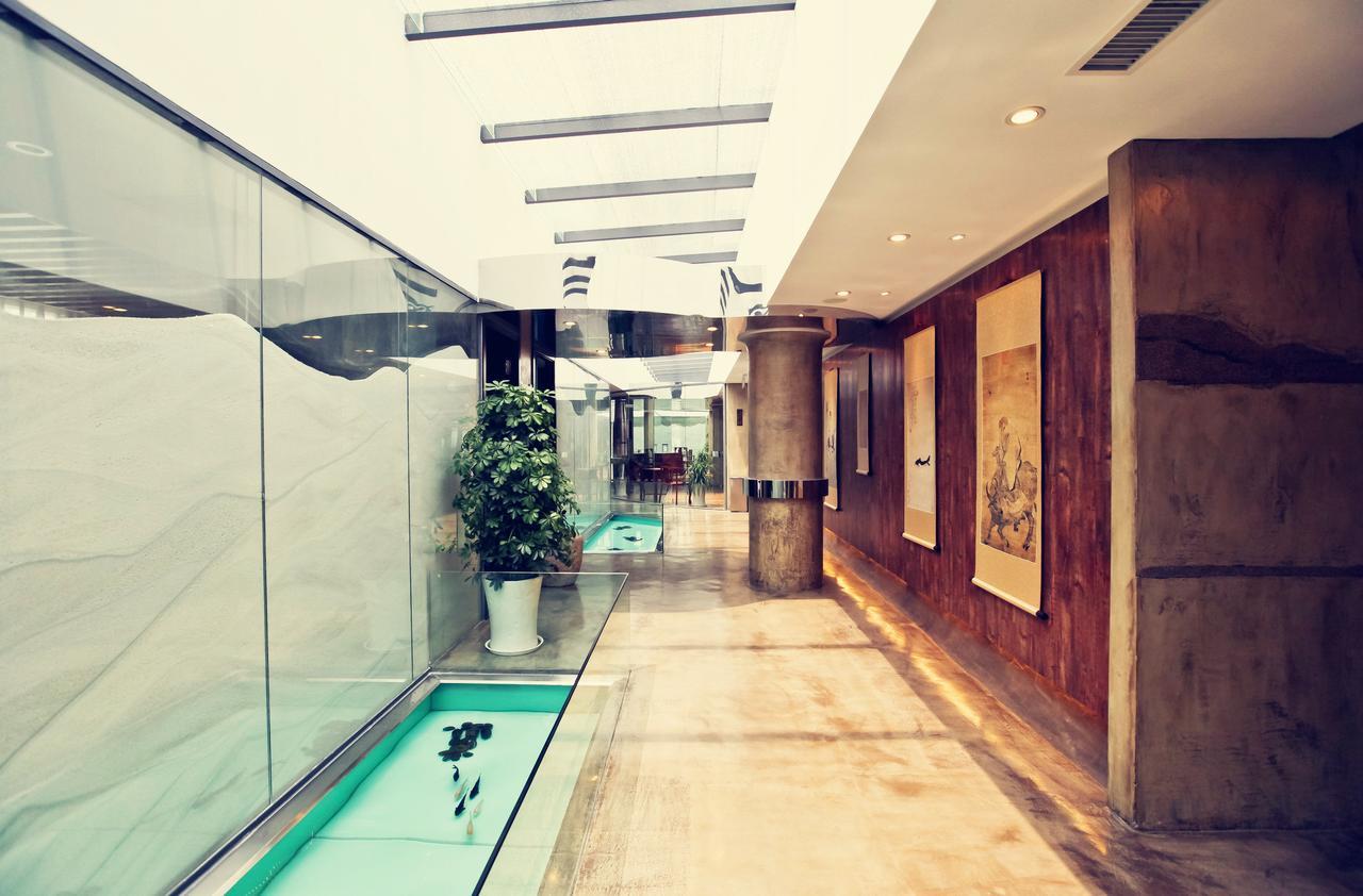 China Community Culture & Art Hotel Циндао Экстерьер фото