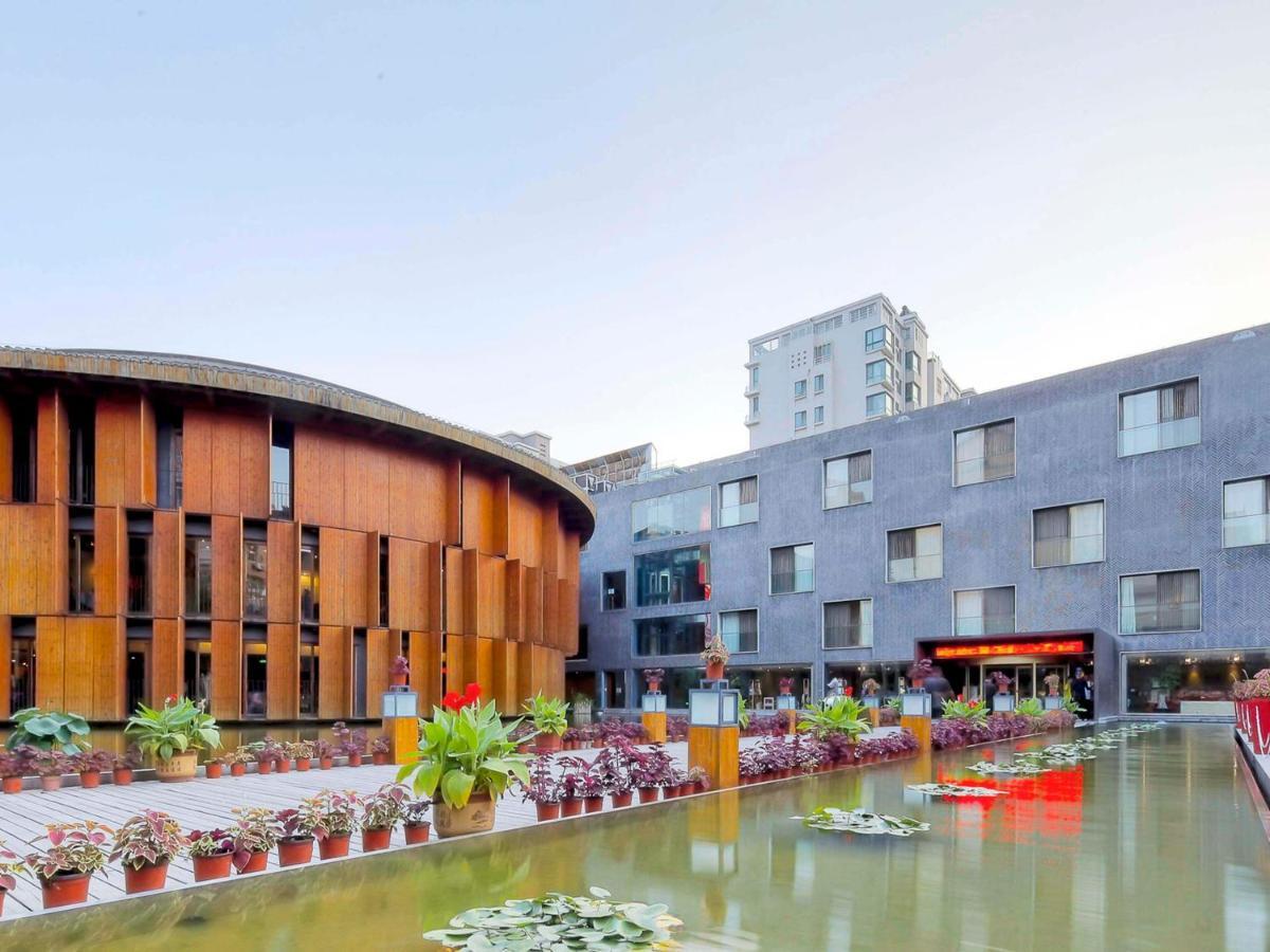 China Community Culture & Art Hotel Циндао Экстерьер фото
