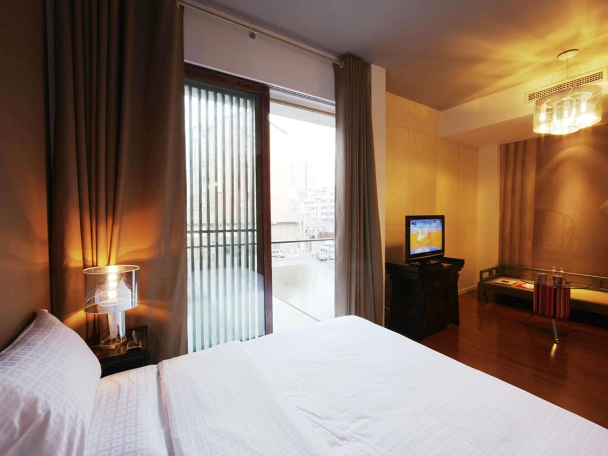 China Community Culture & Art Hotel Циндао Экстерьер фото